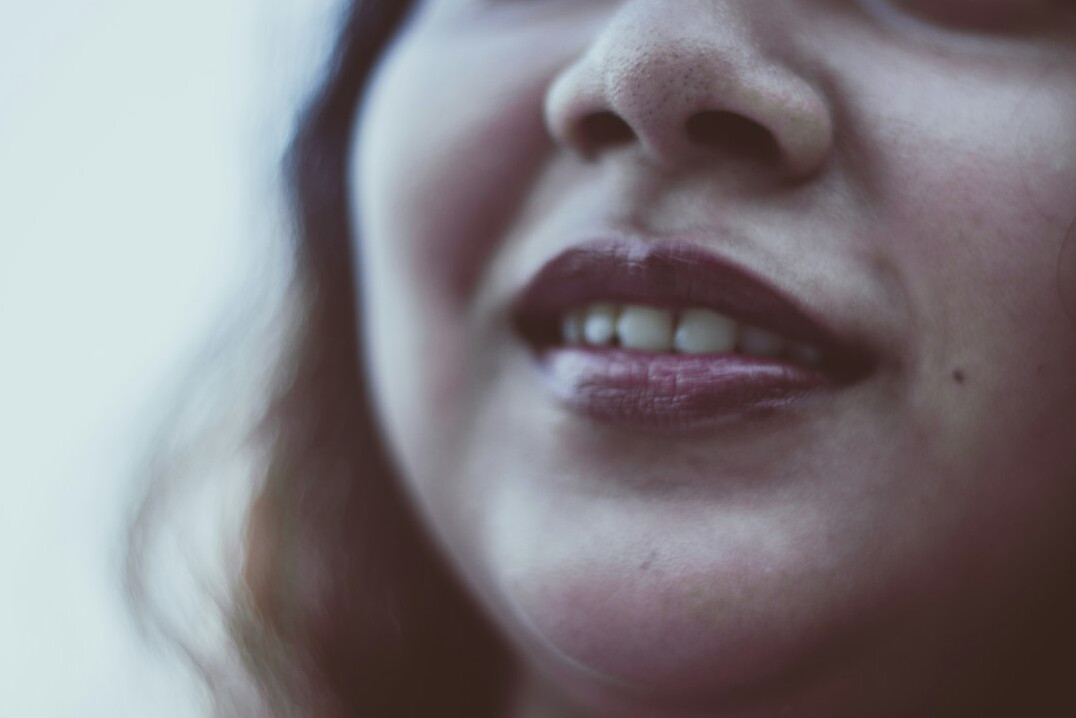 Portrait of a young woman with a gentle smile