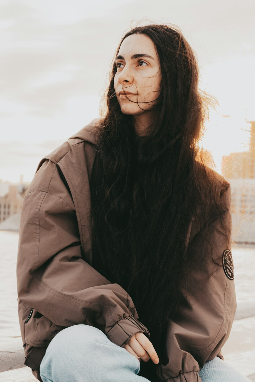Portrait of a woman with long hair smiling
