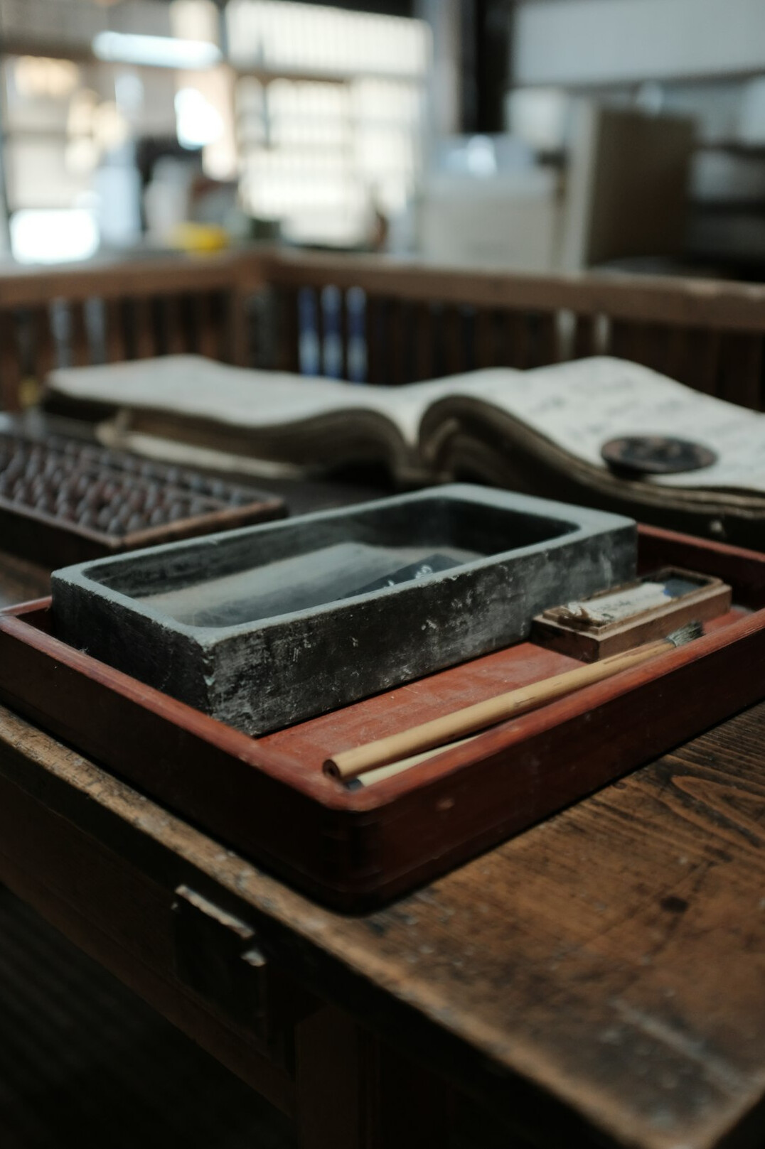 Documents and a pen on a desk during archival research