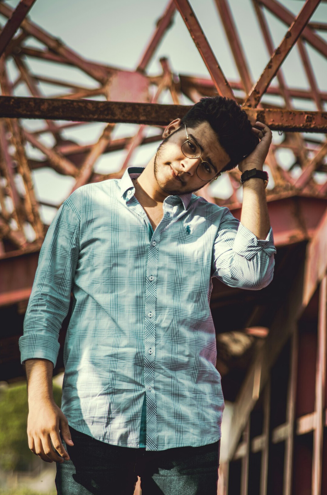 Portrait of a smiling bearded man in a casual shirt